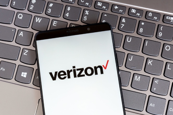 Verizon Wireless phone on laptop keyboard