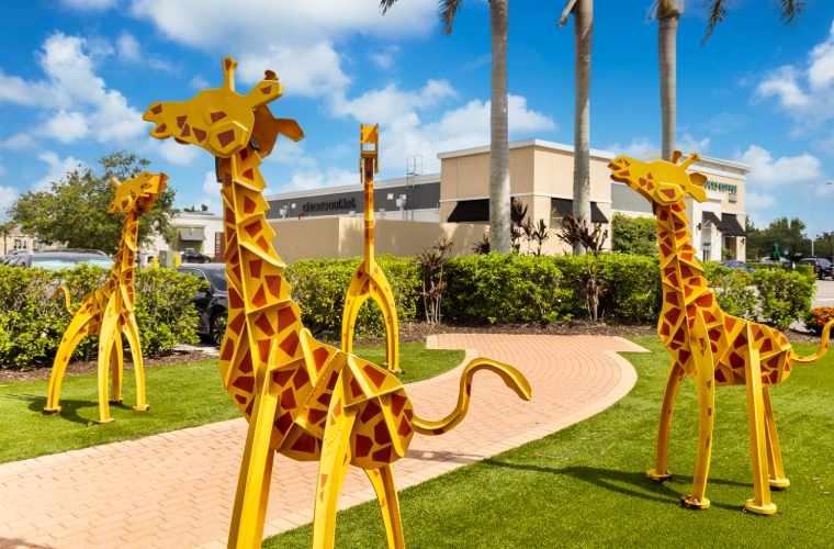 Cocoplum Village Shops giraffe sculptures